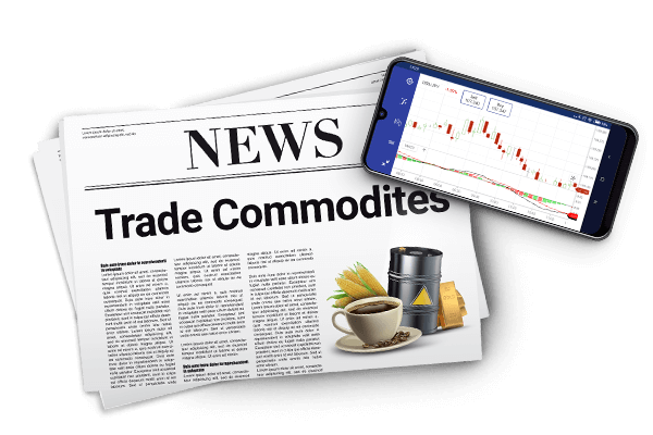 An iPhone App screen on a newspaper with the title of ‘Trade Commodities.’ An iPhone App screen on a newspaper with the title of ‘Trade Commodities.’