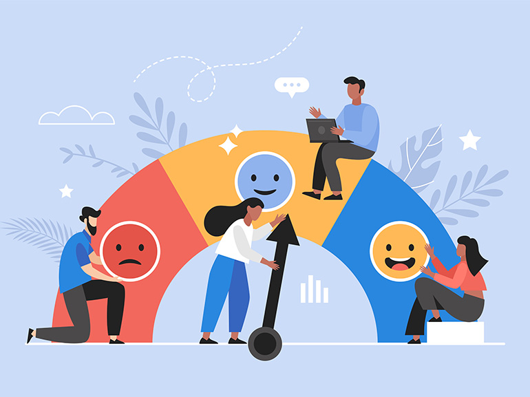 A team working on a customer satisfaction meter with emotions icons